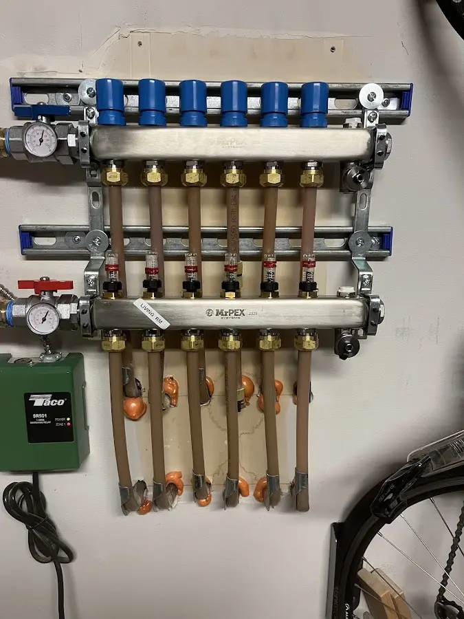 Plumber performing Water Heater Repair at a residential property in Santa Rosa